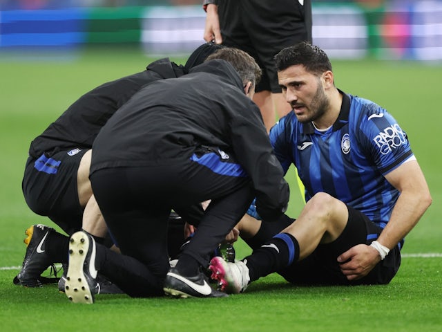 Atalanta's Sead Kolasinac receives medical attention after sustaining an injury on May 2, 2024