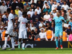 Tottenham Hotspur's Guglielmo Vicario and Yves Bissouma react after Liverpool's Andrew Robertson scores their second goal on May 5, 2024