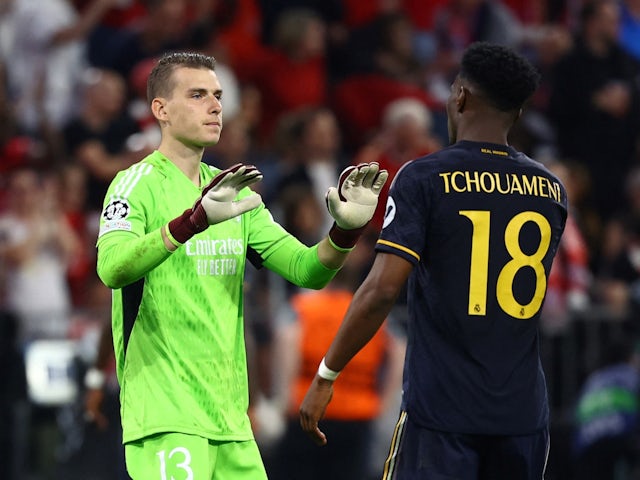 Real Madrid's Andriy Lunin and Aurelien Tchouameni react after the match on April 30, 2024