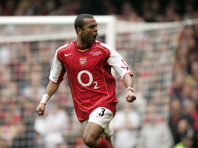 Arsenal's Ashley Cole celebrates after scoring against Manchester United during the FA Cup final penalty shootout at the Millennium Stadium in Cardiff, Wales May 21, 2005