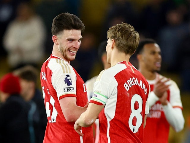Arsenal's Declan Rice and Martin Odegaard celebrate after the match on April 20, 2024