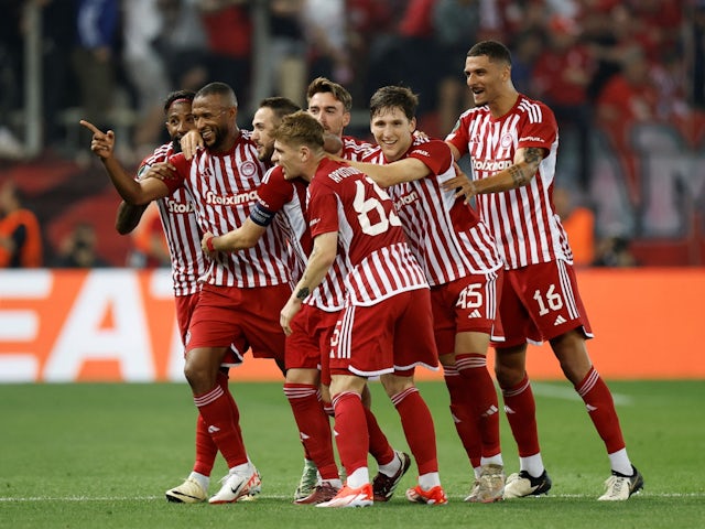 Olympiacos' Ayoub El Kaabi celebrates scoring their second goal with teammates on May 9, 2024