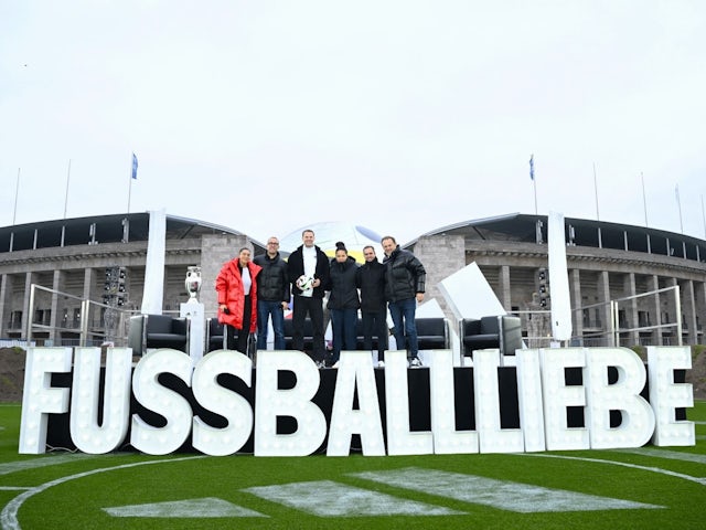 Valentina Marceri, Sam Handy, vice president of design at Adidas football, Germany's Manuel Neuer, former footballers Celia Sasic and Philipp Lahm, and Bjorn Gulden, Adidas CEO , pose with the Euro 2024 match ball 'Fussballliebe' on November 15, 2023