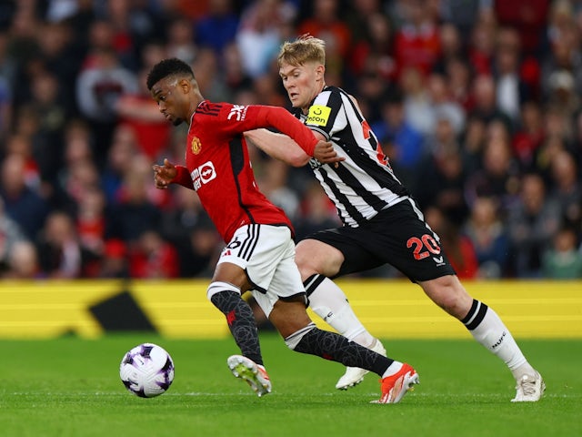 Manchester United's Amad Diallo in action with Newcastle United's Lewis Hall on May 15, 2024