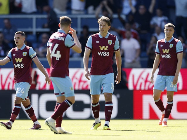 Burnley players look dejected after Nottingham Forest's Chris Wood scores on May 19, 2024