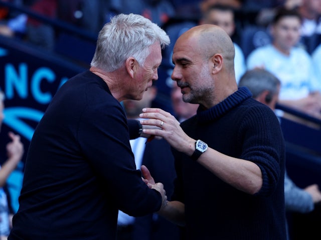 West Ham United manager David Moyes with Manchester City manager Pep Guardiola before the match on May 19, 2024