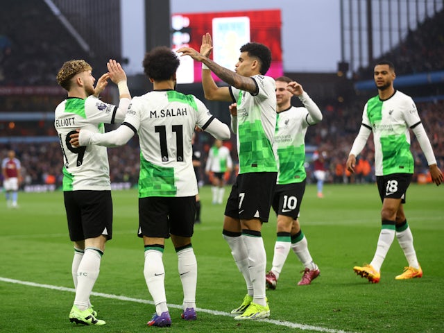Liverpool's Luis Diaz, Harvey Elliott, Mohamed Salah and teammates celebrate after Aston Villa's Emiliano Martinez scored an own goal on May 13, 2024