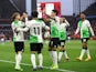 Liverpool's Luis Diaz, Harvey Elliott, Mohamed Salah and teammates celebrate after Aston Villa's Emiliano Martinez scored an own goal on May 13, 2024