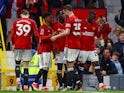 Manchester United's Amad Diallo celebrates scoring their second goal with teammates on May 15, 2024