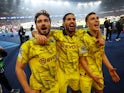 Borussia Dortmund's Mats Hummels, Emre Can and Nico Schlotterbeck celebrate after the match on May 7, 2024