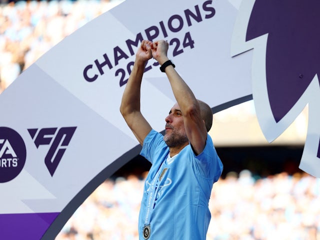 Manchester City manager Pep Guardiola celebrates after winning the Premier League on May 19, 2024