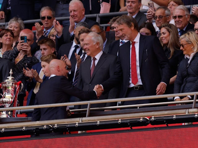 Manchester United manager Erik ten Hag shakes hands with co-owner Sir Jim Ratcliffe after winning the FA Cup on May 25, 2024