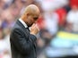 Manchester City manager Pep Guardiola looks dejected after the match on May 25, 2024
