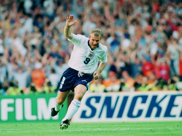 Alan Shearer celebrates scoring for England in 1996
