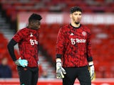 Manchester United's Andre Onana and Altay Bayindir during the warm up before the match on December 30, 2023