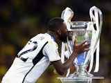 Real Madrid's Antonio Rudiger kisses the trophy during the presentation as he celebrates after winning the Champions League on June 1, 2024