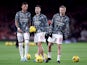 Arsenal's Ben White, Gabriel Martinelli and Oleksandr Zinchenko during the warm up before the match in December 2023