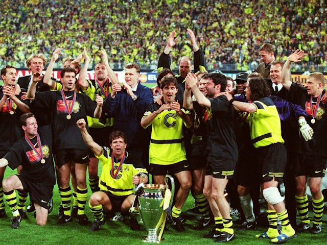 Borussia Dortmund celebrate with the trophy after winning the Champions League final on May 28, 1997