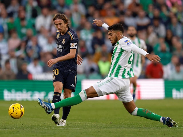Real Betis' Chadi Riad in action with Real Madrid's Luka Modric on December 9, 2023