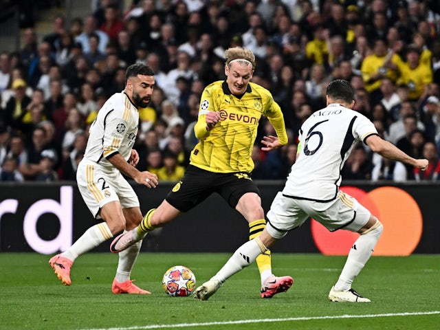 Borussia Dortmund's Julian Brandt shoots at goal against Real Madrid on June 1, 2024