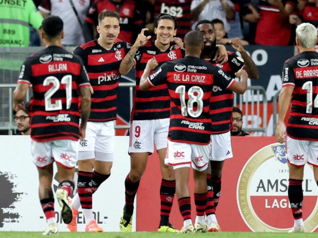 Flamengo's Pedro celebrates scoring their first goal with teammates on May 29, 2024