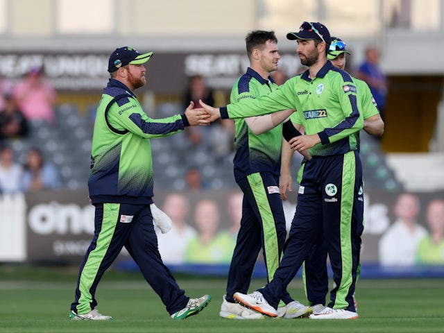 Ireland's Paul Stirling celebrates with teammates on August 3, 2022