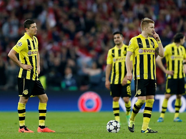 Borussia Dortmund's Robert Lewandowski and Marco Reus look dejected on May 25, 2013
