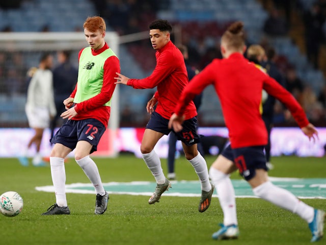 Liverpool's Sepp van den Berg and Ki-Jana Hoever during the warm up before the match in December 2019