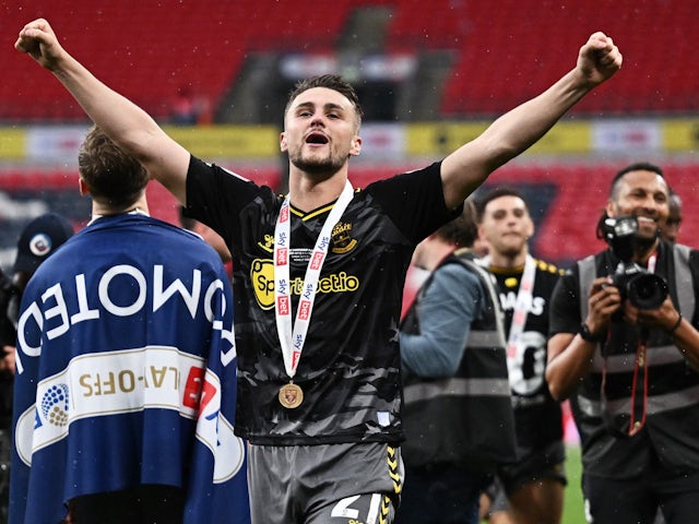 Southampton's Taylor Harwood-Bellis celebrates after winning the Championship Play-Off final on May 23, 2024