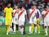 Luis Abram and his Peru teammates walk off dejected following a November 2023 World Cup qualifier