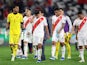 Luis Abram and his Peru teammates walk off dejected following a November 2023 World Cup qualifier