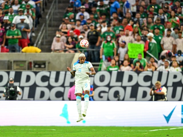 Wesley Decas wins a header for Honduras at the 2023 Gold Cup