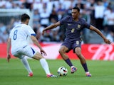 Bosnia and Herzegovina's Armin Gigovic in action with England's Trent Alexander-Arnold on June 3, 2024