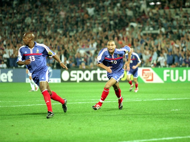 France striker David Trezeguet celebrates scoring the golden goal to win the Euro 2000 final