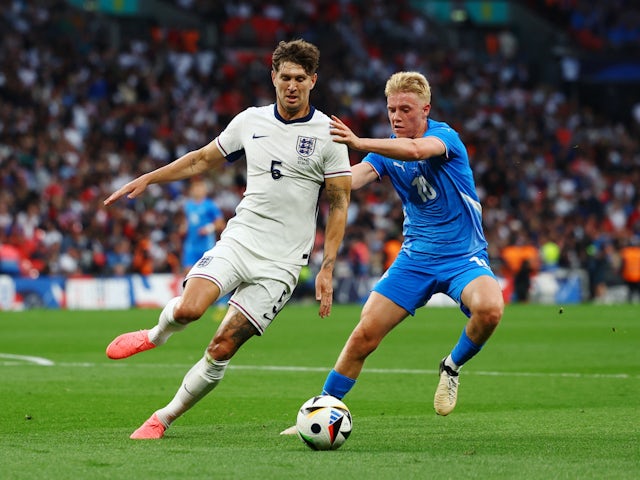 England's John Stones in action with Iceland's Hakon Arnar Haraldsson on June 7, 2024