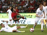Portugal's Goncalo Guedes in action with Czech Republic's Michal Sadilek and Vaclav Jemelka on June 9, 2022
