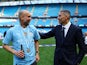 Manchester City manager Pep Guardiola celebrates with chairman Khaldoon Al Mubarak after winning the Premier League on May 19, 2024