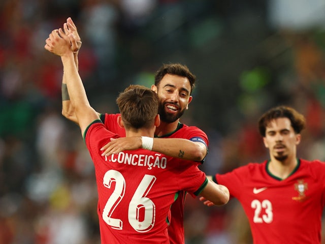 Portugal's Bruno Fernandes celebrates scoring their third goal with Francisco Conceicao on June 4, 2024
