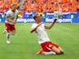 Poland forward Adam Buksa celebrates scoring against Netherlands on June 16, 2024.