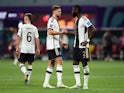 Germany's Antonio Rudiger shakes hands with Niclas Fullkrug after the match  on November 23, 2022
