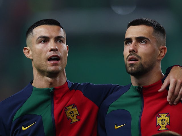 Portugal's Cristiano Ronaldo and Diogo Costa line up before the match on November 19, 2023
