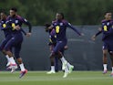 England's Eberechi Eze, Joe Gomez and Ezri Konsa during training on June 12, 2024