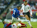 England's Stephen Gerrard wins the ball from Serbia and Montenegro's Zoran Mirkovic to score on June 3, 2003