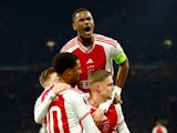 Ajax's Kenneth Taylor celebrates scoring their second goal with Jorrel Hato on December 14, 2023.