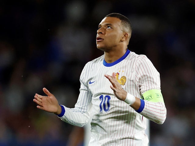 France's Kylian Mbappe reacts after he misses a chance to score on June 9, 2024 
