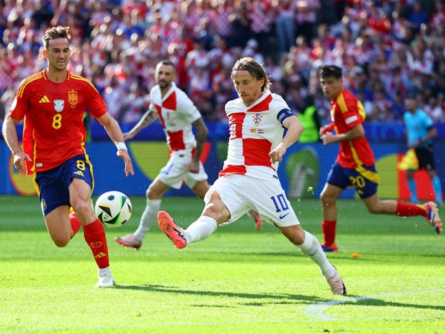 Spain's Fabian Ruiz in action with Croatia's Luka Modric on June 15, 2024
