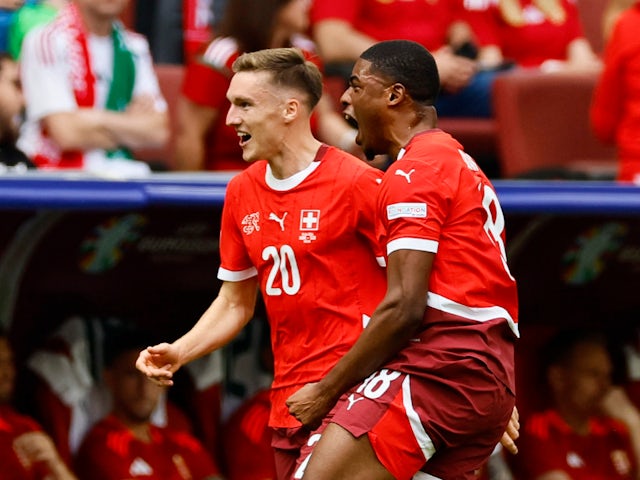 Switzerland's Kwadwo Duah celebrates scoring their first goal with Michel Aebischer on June 15, 2024