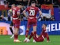 Serbia's Aleksandar Mitrovic and Sergej Milinkovic-Savic look down at injured teammate Filip Kostic on June 16, 2024 [IMAGO]