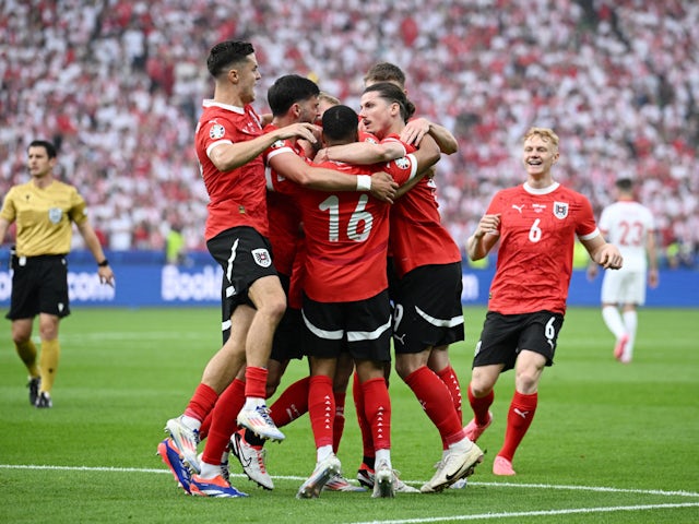 Austria celebrate taking the lead against Poland at Euro 2024 on June 21, 2024.