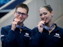 Bronze medallists, Britain's Beatrice Crass and Ranjuo Tomblin pose with their medals after finishing third in the mixed duet free final on June 12, 2024